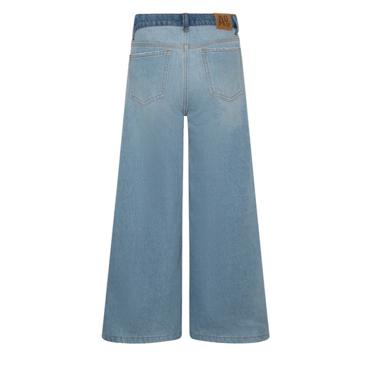 Light blue wide-leg jeans on a white background