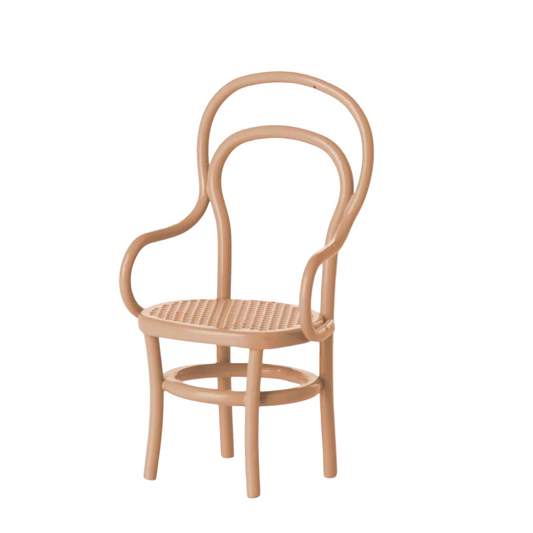 Beige wicker chair on a white background