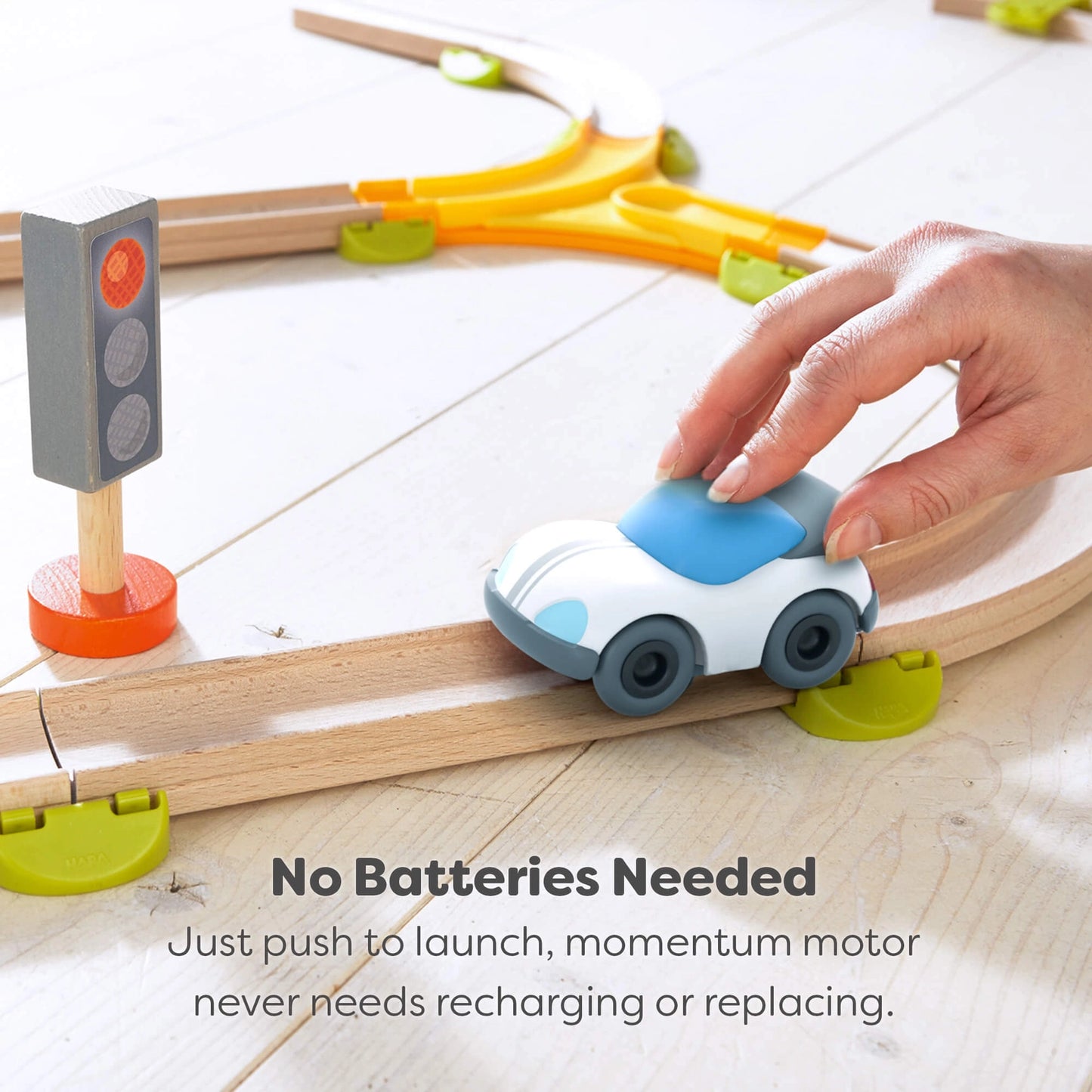 HABA WHITE SPEEDSTER CAR WITH MOMENTUM MOTOR