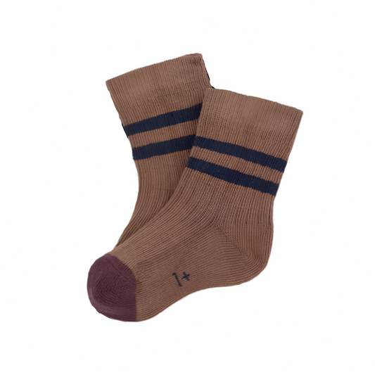 Pair of brown socks with navy stripes on a white background