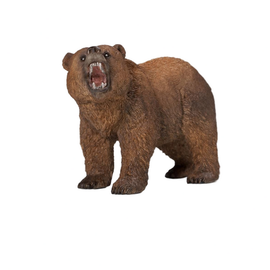 Brown bear figurine on a white background