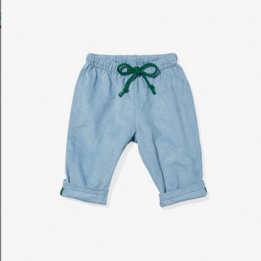 Light blue baby pants with a green drawstring on a white background