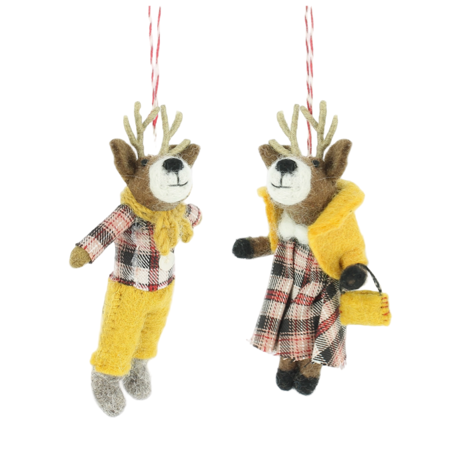 Two deer ornaments wearing yellow jackets and plaid outfits on a white background