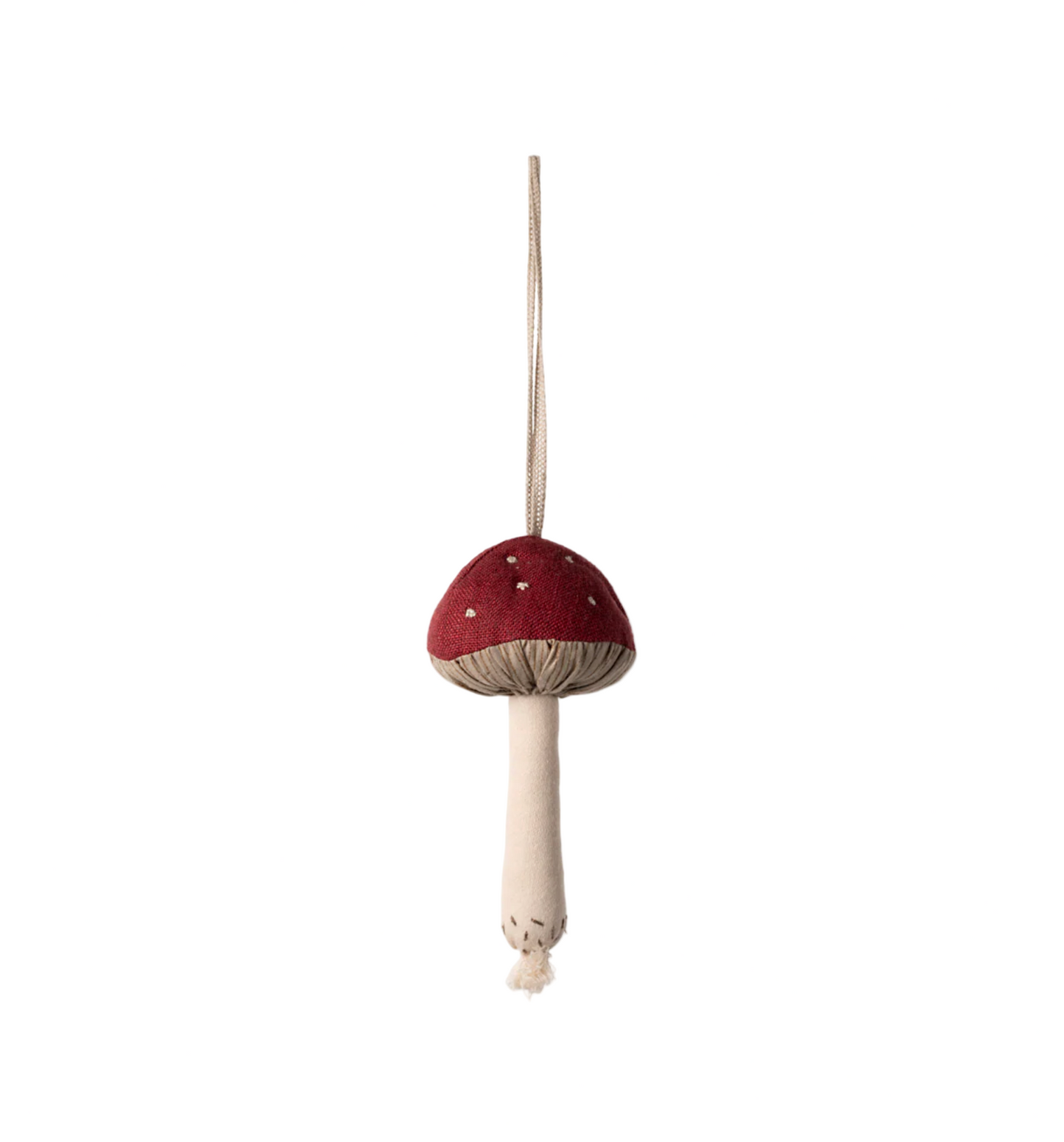 Red mushroom ornament with a white stem on a white background