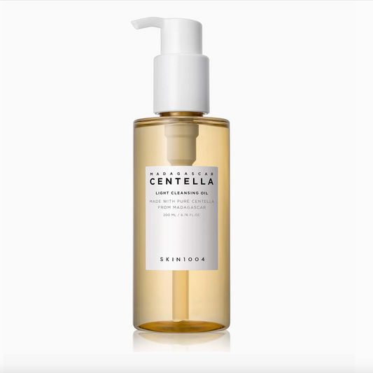 Bottle of Skinfood Madangwon Centella Light Cleansing Oil on a white background